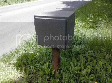 what are the metal boxes on roads|Small Grey Boxes on roadside .